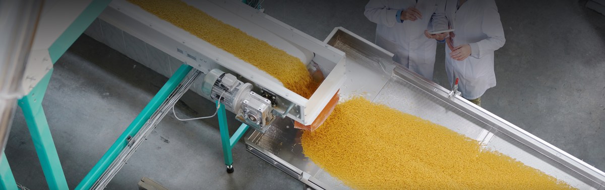 Technical team on a food production line during the OnXR swab validation phase